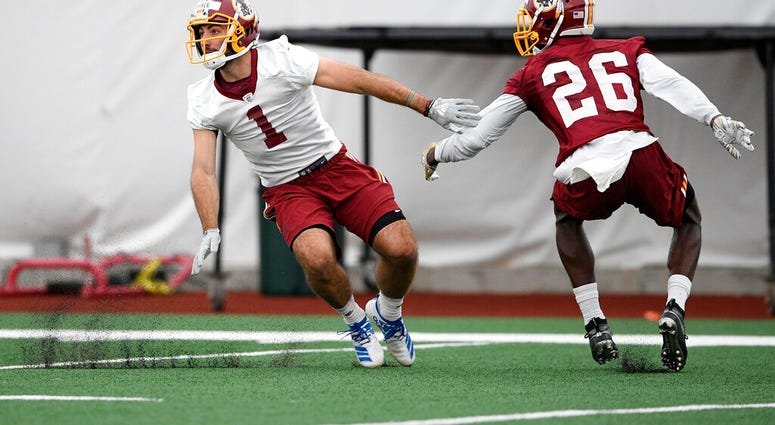 Washington Redskins wide receiver VInny Papale (1) runs a drill against cornerback Tyler Green (26) during an NFL football rookie camp, Saturday, May 11, 2019, in Ashburn, Va. (AP Photo/Nick Wass) Washington Redskins wide receiver VInny Papale (1) runs a drill against cornerback Tyler Green (26) during an NFL football rookie camp, Saturday, May 11, 2019, in Ashburn, Va. (AP Photo/Nick Wass)