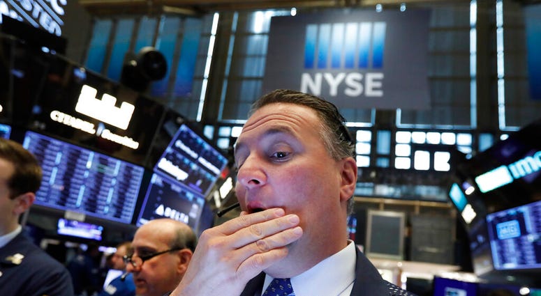 In this May 9, 2019, file photo trader Jonathan Corpina works on the floor of the New York Stock Exchange. The U.S. stock market opens at 9:30 a.m. EDT on Monday, May 13. (AP Photo/Richard Drew, File)