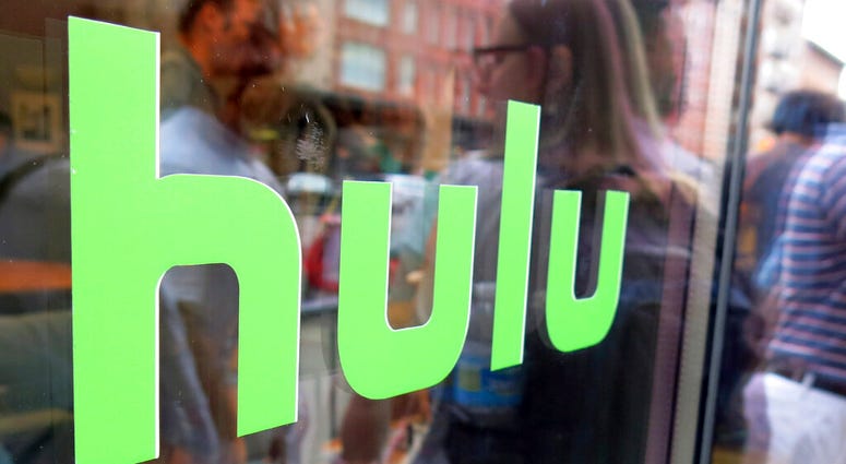 FILE - This June 27, 2015, file photo, shows the Hulu logo on a window at the Milk Studios space in New York. (AP Photo/Dan Goodman, File) FILE - This June 27, 2015, file photo, shows the Hulu logo on a window at the Milk Studios space in New York. (AP Photo/Dan Goodman, File)
