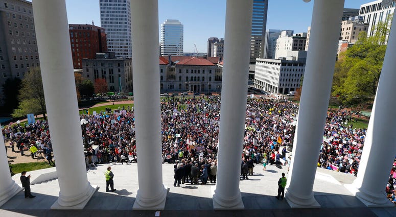 FILE - In this April 3, 2019, file photo, Right to Life marchers gather on the steps of the Capitol to listen to speakers in Richmond, Va. As abortion opponents cheer the passage of fetal heartbeat laws and other restrictions on the procedure, abortion-ri