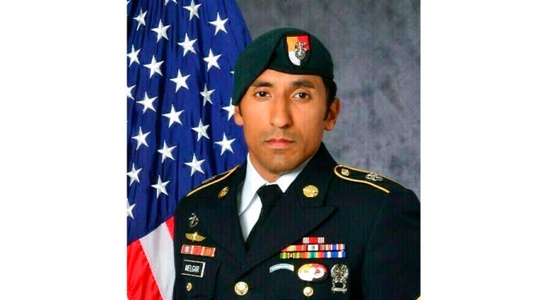 This undated photo provided by the U.S. Army shows U.S. Army Staff Sgt. Logan Melgar Green Beret, who died from non-combat related injuries in Mali in June 2017. The attorney for Navy SEAL Adam Matthews, one of four U.S. servicemen charged in the death of