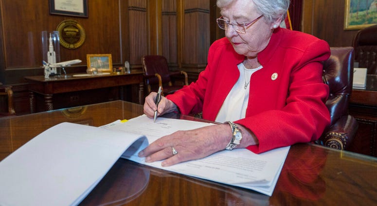 Alabama Governor Kay Ivey signs abortion bill