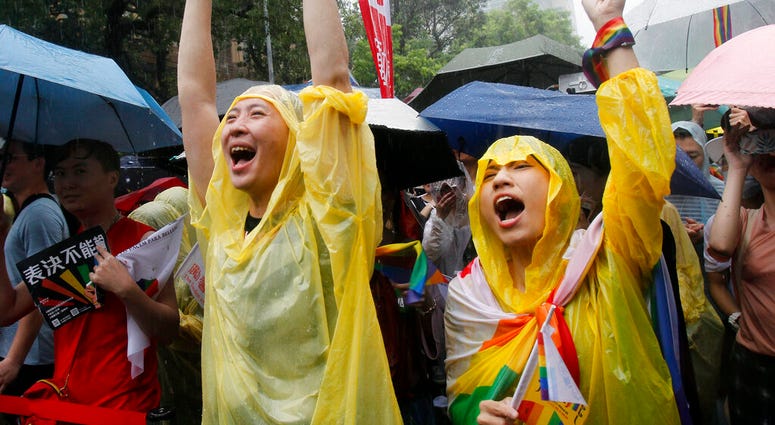 Gay Marriage supporters in Taipei celebrate the news