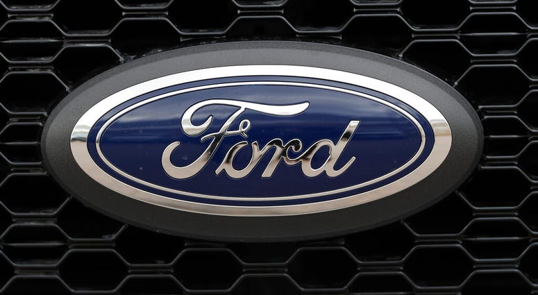 In this Feb. 17, 2019, file photo the company logo is displayed on the grille of an unsold 2019 F150 pickup truck at a Ford dealership in Broomfield, Colo. (AP Photo/David Zalubowski, File) In this Feb. 17, 2019, file photo the company logo is displayed on the grille of an unsold 2019 F150 pickup truck at a Ford dealership in Broomfield, Colo. (AP Photo/David Zalubowski, File)