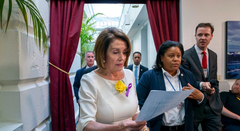 Speaker of the House Nancy Pelosi, D-Calif., departs a meeting with the Democratic Caucus where members heard from former CIA Director John Brennan about the situation in Iran. (AP Photo/J. Scott Applewhite) Speaker of the House Nancy Pelosi, D-Calif., departs a meeting with the Democratic Caucus where members heard from former CIA Director John Brennan about the situation in Iran. (AP Photo/J. Scott Applewhite)
