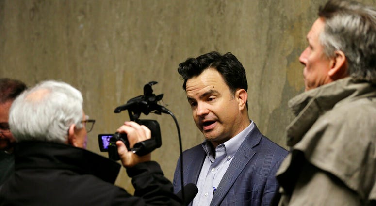 avid Snyder, First Amendment Coalition Executive Director, answers questions outside a courtroom Tuesday, May 21, 2019, in San Francisco. A San Francisco police attorney said that a reporter whose office and work equipment was seized in a police raid can