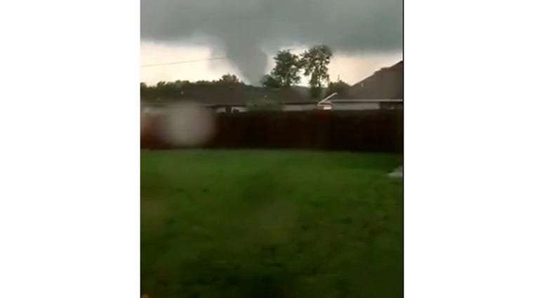 This still image taken from video provided by Shayla Brooks shows a tornado on Wednesday, May 22, 2019, in Carl Junction, Mo. (Shayla Brooks via AP)