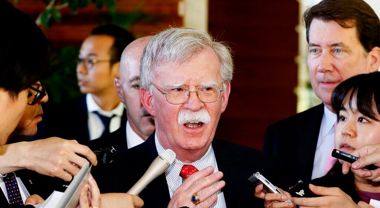 FILE - In this Friday, May 24, 2019, file photo, U.S. National Security Adviser John Bolton is surrounded by reporters at the prime minister's official residence in Tokyo, Japan. (Yohei Kanasashi/Kyodo News via AP, File) FILE - In this Friday, May 24, 2019, file photo, U.S. National Security Adviser John Bolton is surrounded by reporters at the prime minister's official residence in Tokyo, Japan. (Yohei Kanasashi/Kyodo News via AP, File)