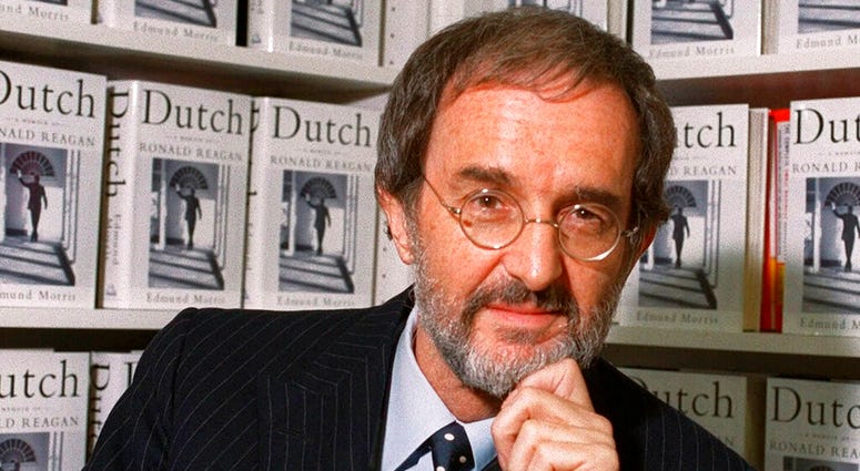 FILE - In this Wednesday, Sept. 29, 1999, file photo, Edmund Morris, author of "Dutch: A Memoir of Ronald Reagan," poses at Random House in New York. (AP Photo/Marty Lederhandler, File) FILE - In this Wednesday, Sept. 29, 1999, file photo, Edmund Morris, author of "Dutch: A Memoir of Ronald Reagan," poses at Random House in New York. (AP Photo/Marty Lederhandler, File)
