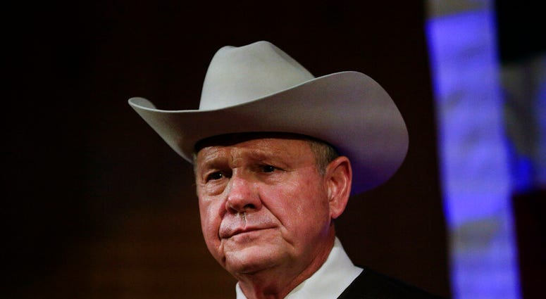 FILE - In this Sept. 25, 2017, file photo, Roy Moore speaks at a rally in Fairhope, Ala. (AP Photo/Brynn Anderson, File) FILE - In this Sept. 25, 2017, file photo, Roy Moore speaks at a rally in Fairhope, Ala. (AP Photo/Brynn Anderson, File)
