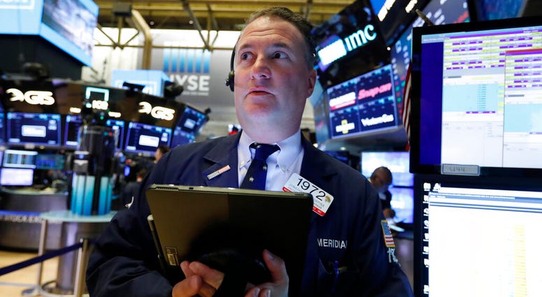 Trader Jonathan Corpina works on the floor of the New York Stock Exchange, Wednesday, May 29, 2019. Stocks are getting off to a weak start on Wall Street led by drops in technology and health care companies. (AP Photo/Richard Drew) Trader Jonathan Corpina works on the floor of the New York Stock Exchange, Wednesday, May 29, 2019. Stocks are getting off to a weak start on Wall Street led by drops in technology and health care companies. (AP Photo/Richard Drew)