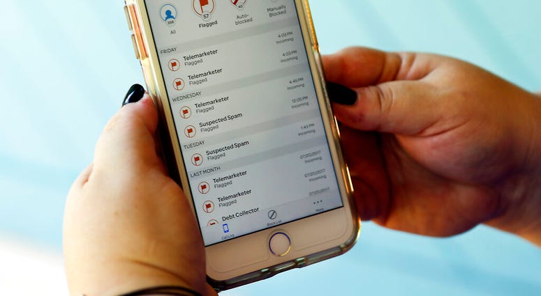 FILE - This Aug. 1, 2017, file photo, shows a call log displayed via an AT&T app on a cellphone in Orlando, Fla. New tools are coming to help fight robocall scams, but don’t expect unwanted calls to disappear. (AP Photo/John Raoux, File) FILE - This Aug. 1, 2017, file photo, shows a call log displayed via an AT&T app on a cellphone in Orlando, Fla. New tools are coming to help fight robocall scams, but don’t expect unwanted calls to disappear. (AP Photo/John Raoux, File)