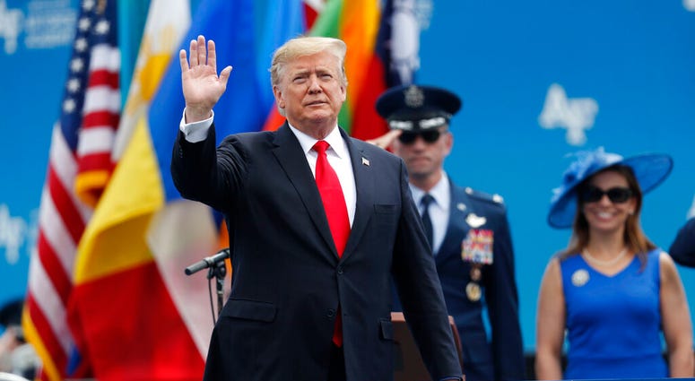 President Donald Trump waves as he takes the stage to speak at the U.S. Air Force Academy graduation Thursday, May 30, 2019 at Air Force Academy, Colo. (AP Photo/David Zalubowski)