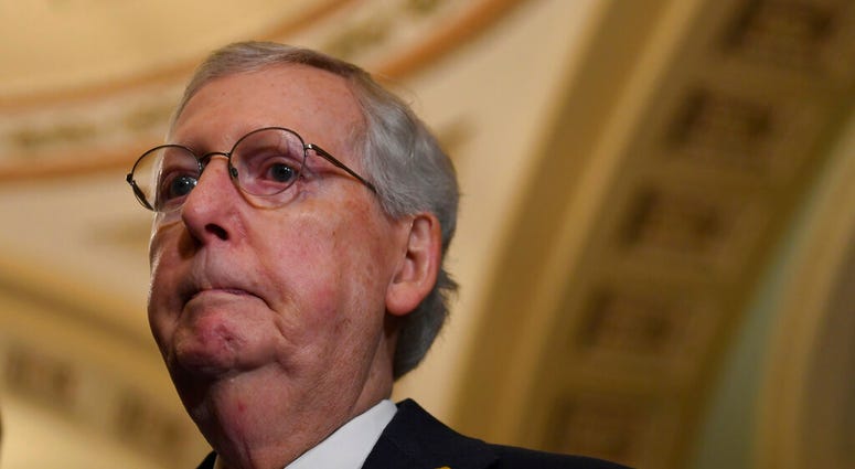 Senate Majority Leader Mitch McConnell of Ky., speaks to reporters following the weekly policy lunches on Capitol Hill in Washington, Tuesday, June 4, 2019. (AP Photo/Susan Walsh)