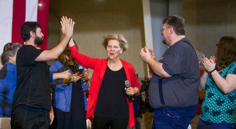 Democratic presidential candidate Elizabeth Warren takes the stage for her Elkhart Community Conversation event on Wednesday, June 5, 2019, at the RV/MH Hall of Fame and Museum in Elkhart, Ind. (Robert Franklin/South Bend Tribune via AP) Democratic presidential candidate Elizabeth Warren takes the stage for her Elkhart Community Conversation event on Wednesday, June 5, 2019, at the RV/MH Hall of Fame and Museum in Elkhart, Ind. (Robert Franklin/South Bend Tribune via AP)