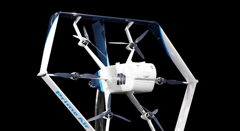 This undated image provided by Amazon shows one of the company's delivery drones. (Jordan Stead/Amazon via AP) This undated image provided by Amazon shows one of the company's delivery drones. (Jordan Stead/Amazon via AP)