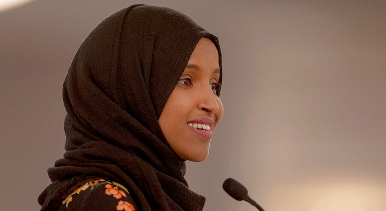 FILE - In this May 18, 2019 file photo, Rep. Ilhan Omar, D-Minn., speaks during the fourth annual Citywide Iftar Dinner in Austin, Texas. A campaign finance investigation found that U.S. Rep. Ilhan Omar filed joint tax returns with her husband before they