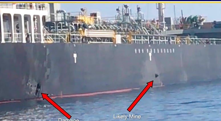 Damage to an oil tanker & a suspected mine