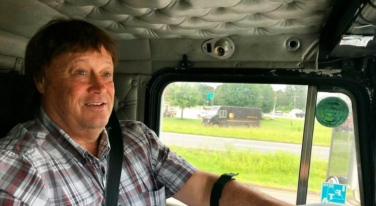 Truck driver Terry Button drives his truck near Opal, Va., Thursday, June 13, 2019. (AP Photo/Tom Sampson) Truck driver Terry Button drives his truck near Opal, Va., Thursday, June 13, 2019. (AP Photo/Tom Sampson)