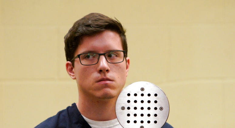 FILE - In this April 30, 2019 file photo, John T. Earnest appears for his arraignment hearing in San Diego. A federal search warrant says Ernest, the sole suspect in a Southern California synagogue shooting told an investigator that he adopted his hatred