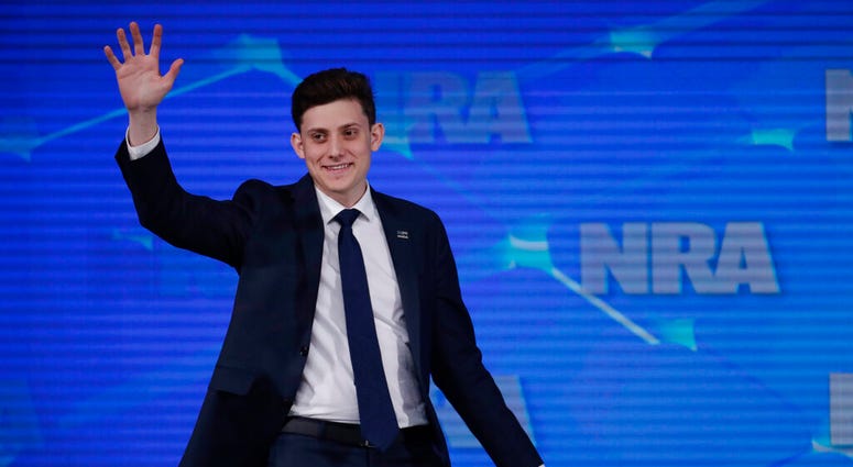 FILE - In this April 26, 2019 file photo, Kyle Kashuv, a survivor of the Marjory Stoneman Douglas High School shooting in Parkland, Fla., speaks at the National Rifle Association Institute for Legislative Action Leadership Forum in Indianapolis. On Monday