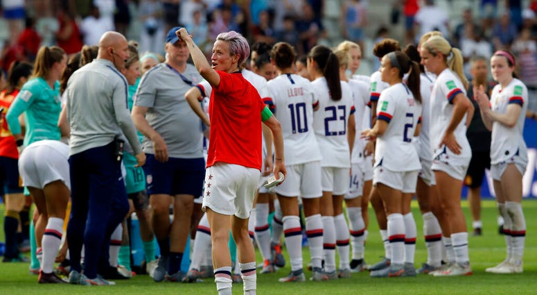 United States'Megan Rapinoe, front, celebrates at the end of the Women's World Cup round of 16 soccer match between Spain and US at the Stade Auguste-Delaune in Reims, France. (AP Photo/Alessandra Tarantino) United States'Megan Rapinoe, front, celebrates at the end of the Women's World Cup round of 16 soccer match between Spain and US at the Stade Auguste-Delaune in Reims, France. (AP Photo/Alessandra Tarantino)