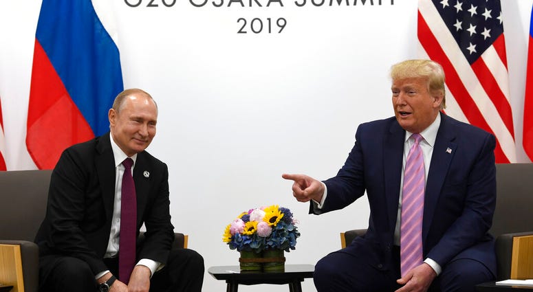 President Donald Trump, right, meets with Russian President Vladimir Putin during a bilateral meeting on the sidelines of the G-20 summit in Osaka, Japan, Friday, June 28, 2019. (AP Photo/Susan Walsh)