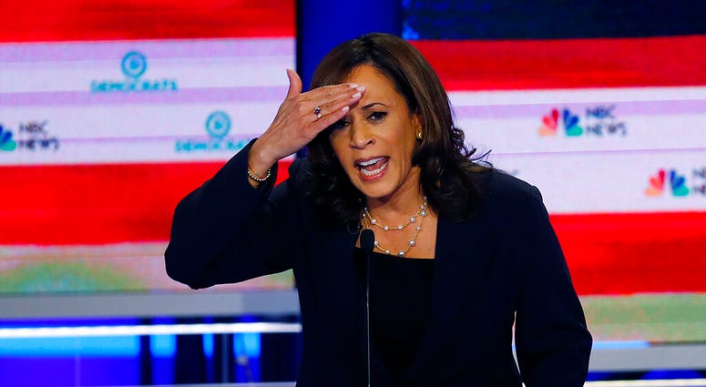 In this June 27, 2019, photo, Democratic presidential candidate Sen. Kamala Harris, D-Calif., gestures during the Democratic primary debate hosted by NBC News at the Adrienne Arsht Center for the Performing Arts in Miami. (AP Photo/Wilfredo Lee) In this June 27, 2019, photo, Democratic presidential candidate Sen. Kamala Harris, D-Calif., gestures during the Democratic primary debate hosted by NBC News at the Adrienne Arsht Center for the Performing Arts in Miami. (AP Photo/Wilfredo Lee)