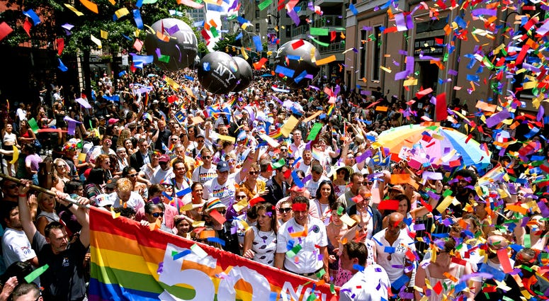 New York Governor Andrew Cuomo, lower front center, joins people participating in the LBGTQ Pride march Sunday, June 30, 2019, in New York. (AP Photo/Craig Ruttle) New York Governor Andrew Cuomo, lower front center, joins people participating in the LBGTQ Pride march Sunday, June 30, 2019, in New York. (AP Photo/Craig Ruttle)