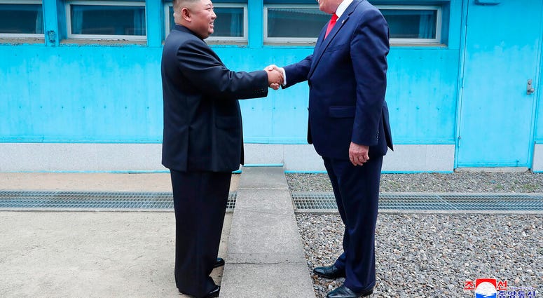 In this Sunday, June 30, 2019, photo provided by the North Korean government, North Korean leader Kim Jong Un, left, and U.S. President Donald Trump shake hands over the military demarcation line. (Korean Central News Agency/Korea News Service via AP) In this Sunday, June 30, 2019, photo provided by the North Korean government, North Korean leader Kim Jong Un, left, and U.S. President Donald Trump shake hands over the military demarcation line. (Korean Central News Agency/Korea News Service via AP)