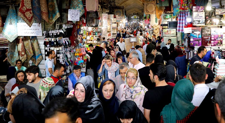 eople shop at the old main bazaar in Tehran, Iran, Tuesday, July 2, 2019. (AP Photo/Ebrahim Noroozi) eople shop at the old main bazaar in Tehran, Iran, Tuesday, July 2, 2019. (AP Photo/Ebrahim Noroozi)