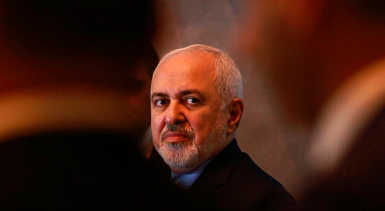 In this March 10, 2019, file photo, Iranian Foreign Minister Mohammad Javad Zarif attends a press conference with his Iraqi counterpart Mohamed Alhakim at the Ministry of Foreign Affairs building in Baghdad, Iraq. (AP Photo/Hadi Mizban, File)