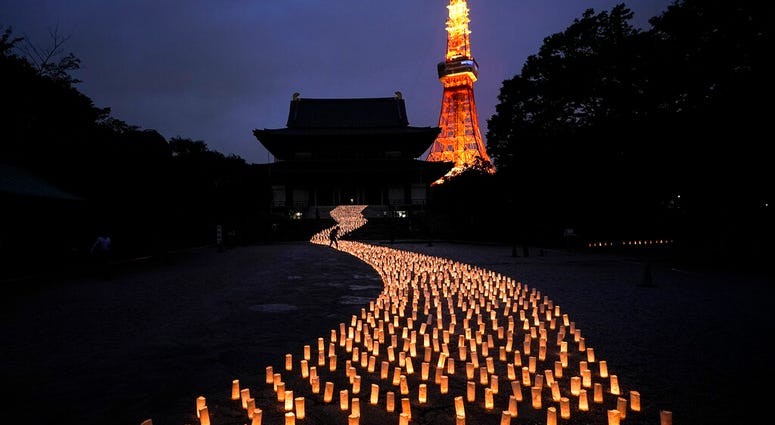 Thousands of candles are arranged in the shape of the Milky Way to celebrate Tanabata, a Japanese star festival, at Zojoji Temple in Tokyo, July 5, 2019. (AP Photo/Jae C. Hong) Thousands of candles are arranged in the shape of the Milky Way to celebrate Tanabata, a Japanese star festival, at Zojoji Temple in Tokyo, July 5, 2019. (AP Photo/Jae C. Hong)