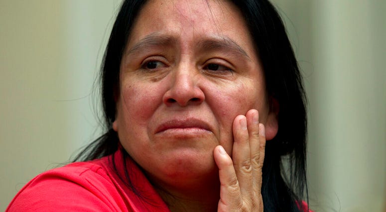 Maria Chavalan-Sut of Guatemala speaks during an interview at the Wesley Memorial United Methodist Church in Charlottesville, Va., on Wednesday, July 17, 2019. (AP Photo/Jose Luis Magana)