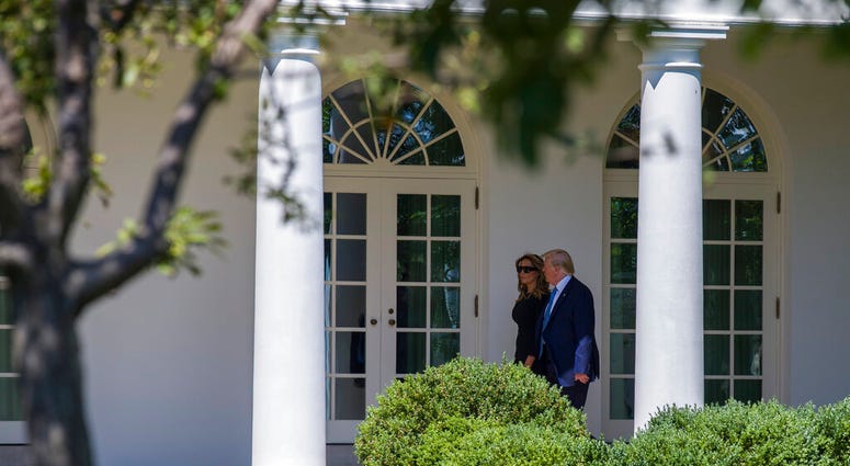 President Donald Trump, accompanied by first lady Melania Trump, walk the Colonnade on the way to the Oval Office, as they return to the White House from the Supreme Court, Monday, July 22, 2019, in Washington. (AP Photo/Alex Brandon) President Donald Trump, accompanied by first lady Melania Trump, walk the Colonnade on the way to the Oval Office, as they return to the White House from the Supreme Court, Monday, July 22, 2019, in Washington. (AP Photo/Alex Brandon)