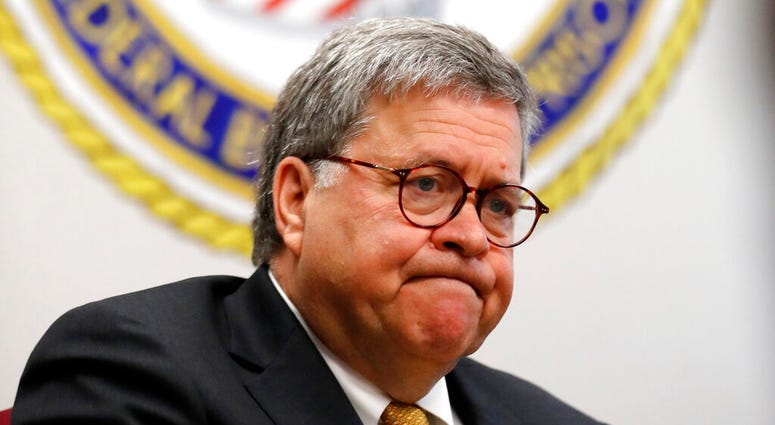 FILE - In this July 8, 2019 file photo, Attorney General William Barr speaks during a tour of a federal prison in Edgefield, S.C. The Justice Department says it will carry out executions of federal death row inmates for the first time since 2003. The anno