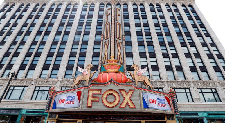 The marquee at the Fox Theatre displays signs for the Democratic presidential debates in Detroit, Monday, July 29, 2019. The second scheduled debates, hosted by CNN, will be held Tuesday, July 30 and Wednesday, July 31. (AP Photo/Paul Sancya)