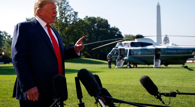 Trump Claims Blacks Like His Comments President Donald Trump talks with reporters before departing for an event to celebrate the 400th anniversary celebration of the first representative assembly at Jamestown, on the South Lawn of the White House,