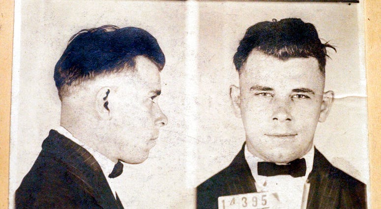 FILE - This file photo shows Indiana Reformatory booking shots of John Dillinger, stored in the state archives, and shows the notorious gangster as a 21-year-old. Records show that Dillinger was admitted into the reformatory on Sept. 16, 1924. The body of