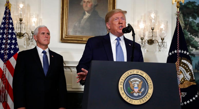 President Donald Trump speaks about the mass shootings in El Paso, Texas and Dayton, Ohio, in the Diplomatic Reception Room of the White House, Monday, Aug. 5, 2019, in Washington. (AP Photo/Evan Vucci)