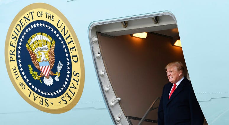 FILE - In this April 15, 2019, file photo, President Donald Trump walks down the steps of Air Force One at Andrews Air Force Base in Md. Four California voters have sued Monday, Aug. 5, 2019, to block a new state law aimed at forcing Republican President