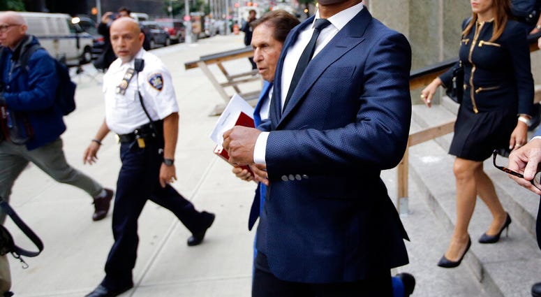 FILE - In this June 13, 2019 file photo, Cuba Gooding Jr. leaves criminal court in New York. A New York City judge has rejected actor Cuba Gooding Jr.'s request to have his groping case thrown out. (AP Photo/Frank Franklin II, File)