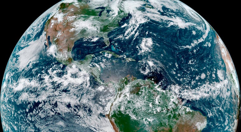 This Thursday, Aug. 8, 2019 satellite photo made availalble by NOAA shows cloud patterns over the Western Hemisphere. On Thursday, Aug. 8, 2019, the National Oceanic and Atmospheric Administration’s Climate Prediction Center said the Atlantic season looks