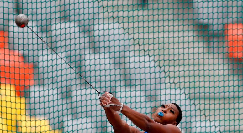 Gwendolyn Berry of United States competes in the women's hammer throw final during the athletics at the Pan American Games in Lima, Peru, Saturday, Aug. 10, 2019. Berry won the gold medal. (AP Photo/Rebecca Blackwell)
