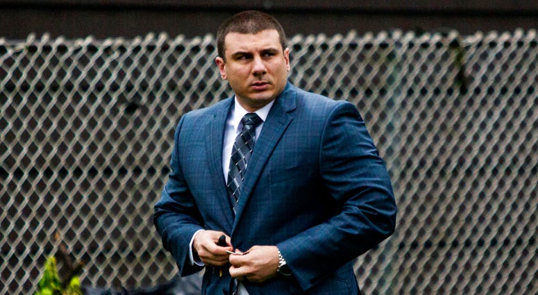 In this May 13, 2019, file photo New York City police officer Daniel Pantaleo leaves his house Monday, May 13, 2019, in Staten Island, N.Y. (AP Photo/Eduardo Munoz Alvarez, File)