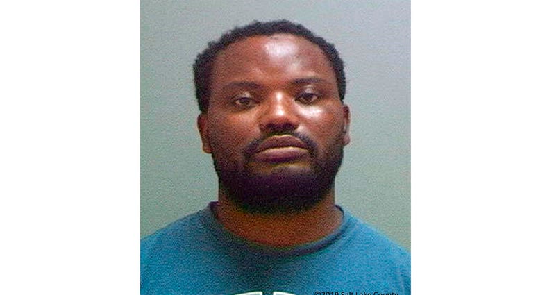 FILE - This file booking photo provided by the Salt Lake County Sheriff's Office shows Ayoola A. Ajayi. Ajayi, a man accused of killing a Utah college student has been charged with sexual abuse and kidnapping of another woman. Charging documents filed Tue