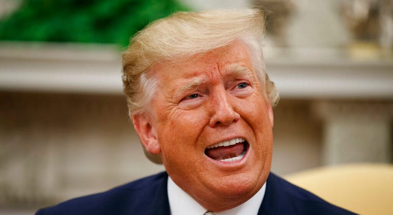 President Donald Trump speaks during a meeting with Romanian President Klaus Iohannis in the Oval Office of the White House, Tuesday, Aug. 20, 2019, in Washington. (AP Photo/Alex Brandon)