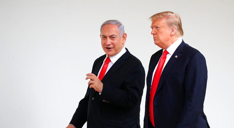 FILE - In this March 25, 2019, file photo, President Donald Trump and visiting Israeli Prime Minister Benjamin Netanyahu walk along the Colonnade of the White House in Washington.