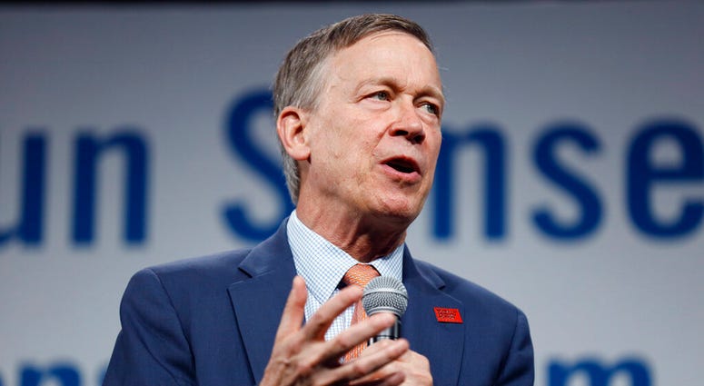 FILE - In this Aug. 10, 2019, file photo, then Democratic presidential candidate former Colorado Gov. John Hickenlooper speaks at the Presidential Gun Sense Forum, in Des Moines, Iowa.