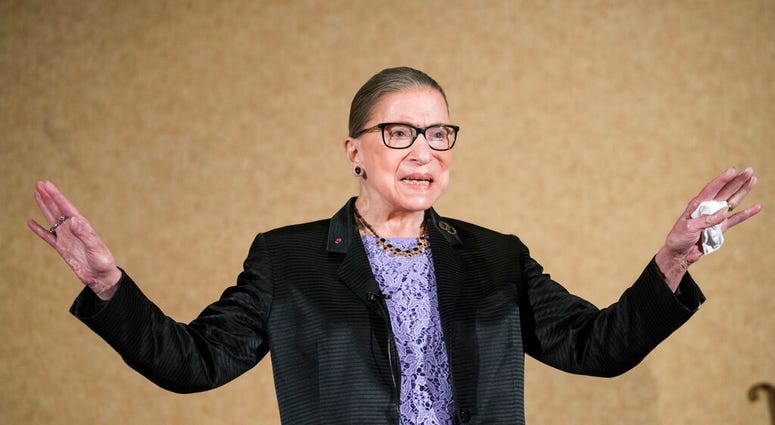 In this Aug. 19, 2016, file photo U.S. Supreme Court Justice, Ruth Bader Ginsburg, is introduced during the keynote address for the State Bar of New Mexico's Annual Meeting in Pojoaque. (AP Photo/Craig Fritz, File)
